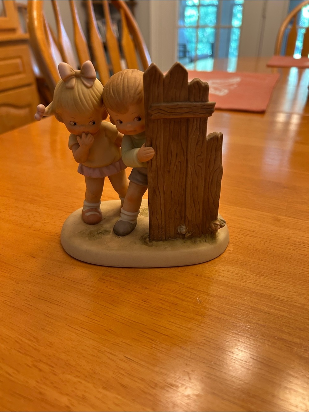 Porcelain Figurine of Children Peeking by Wooden Gate MEMORIES OF YESTERDAY